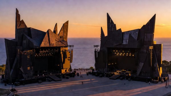 Twin mainstages at Parc del Forum facing the Mediterranean horizon